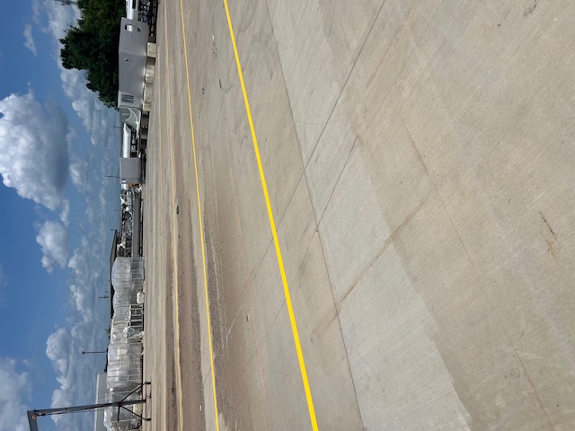 Fresh Striping at Jupiter Bach Manufacturing in Ferry Pass, FL by Parking Lot Maintenance of the Panhandle